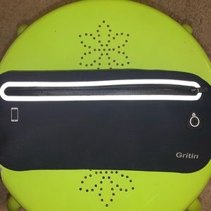 NWT - Ultra slim black water resistant fanny pack.